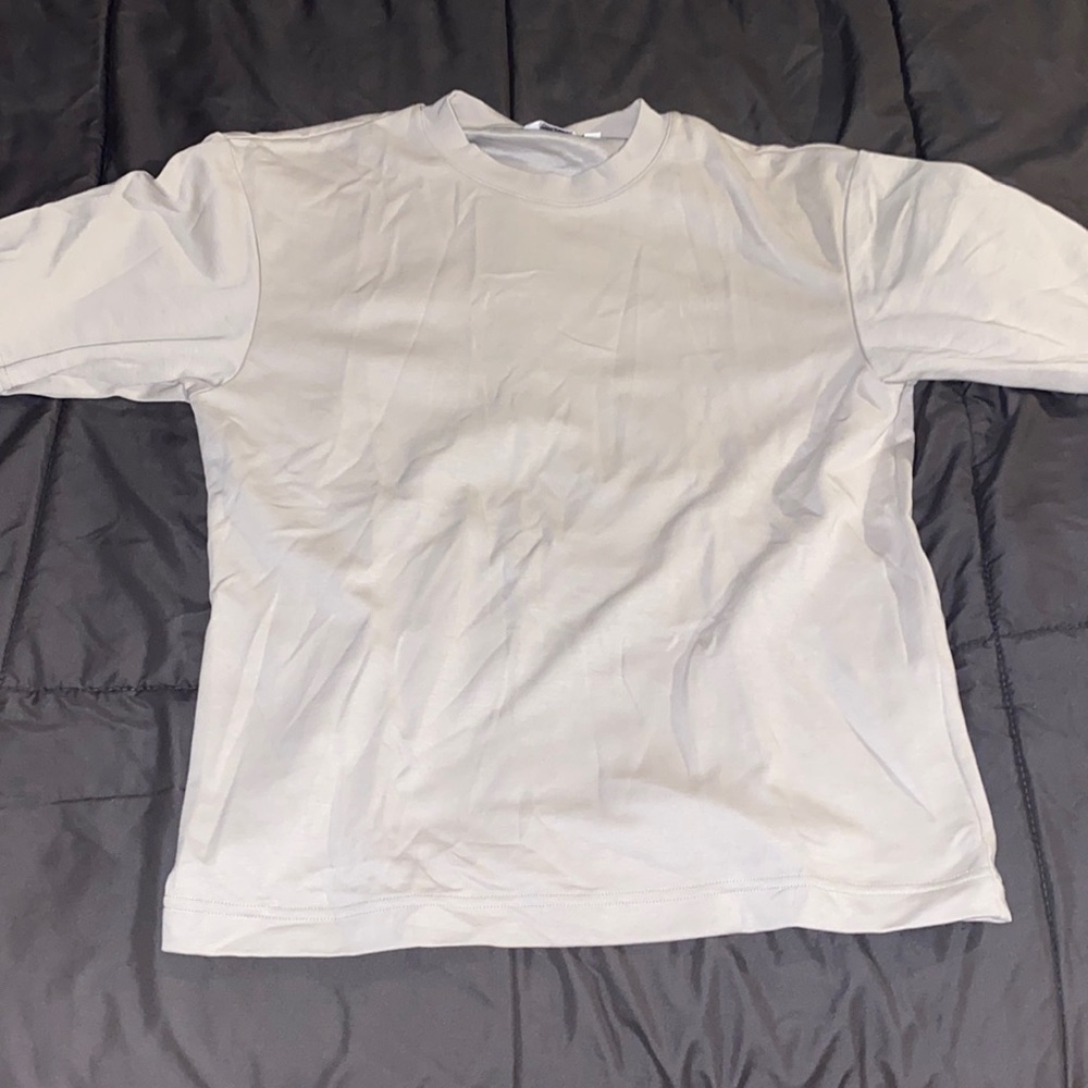 Over sized tan Uniqlo shirt size xs